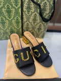 GUCCI Matelassé Heeled Sandals – Gold-Tone Logo | White & Black