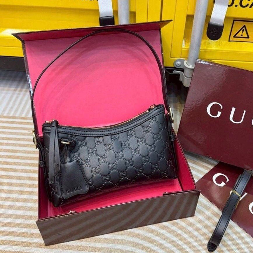 Gucci GG Embossed Leather Shoulder Bag – Rosso Ancora