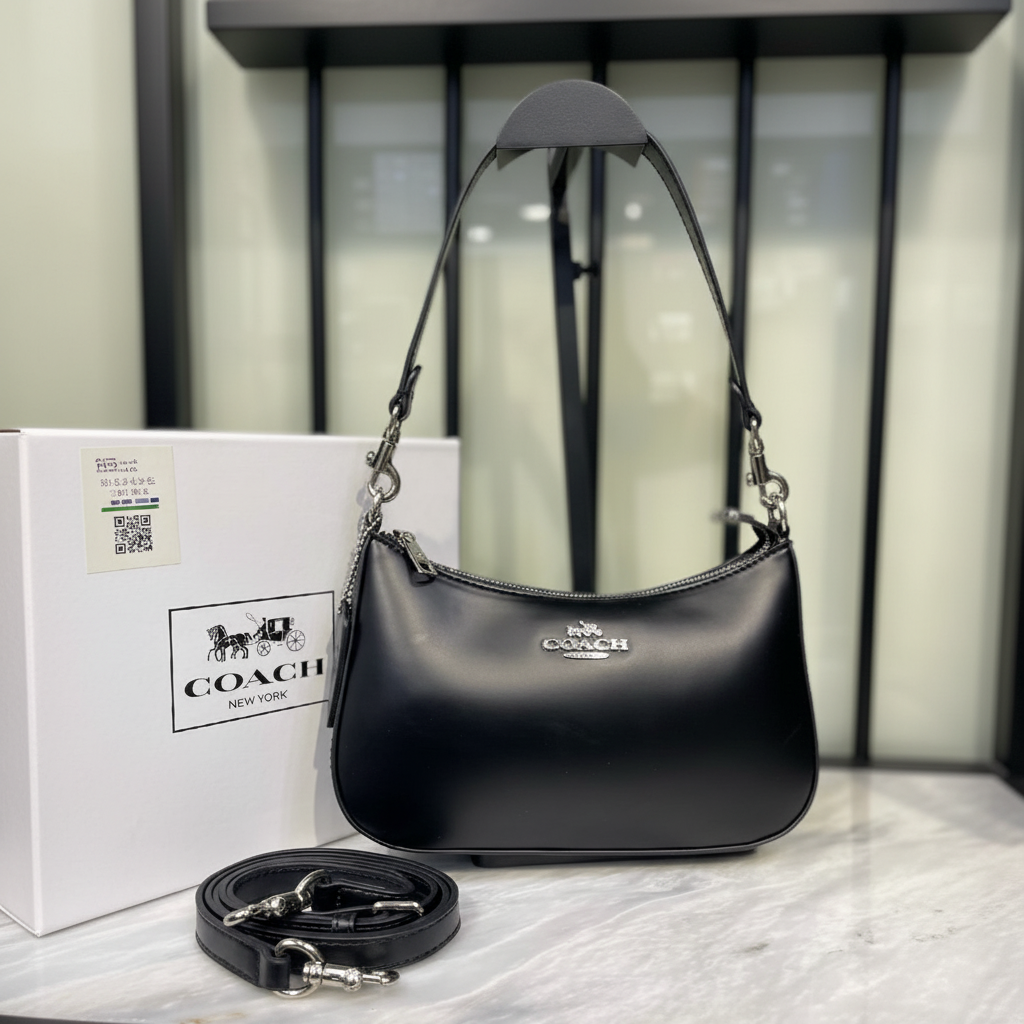 Coach Teri Shoulder Bag Black on white marble surface