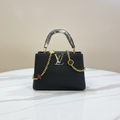 Louis Vuitton Capucines Black Python Handle front view on white marble