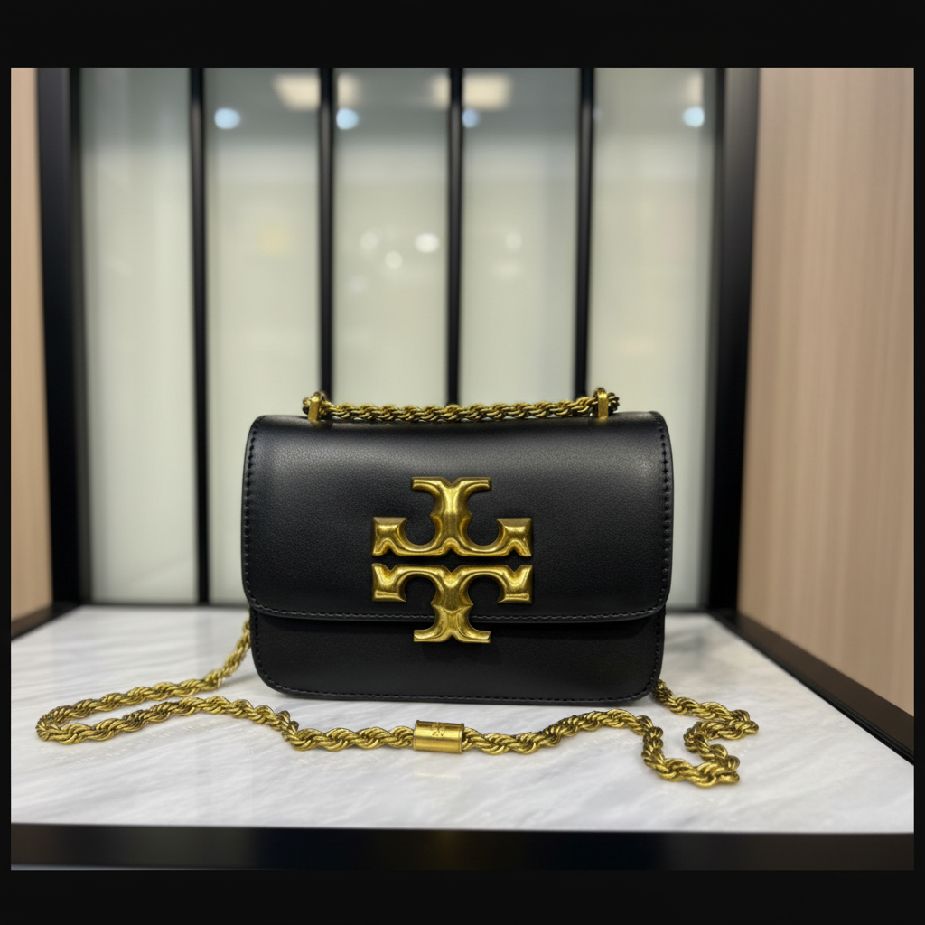 Tory Burch Small Eleanor Black on white marble surface